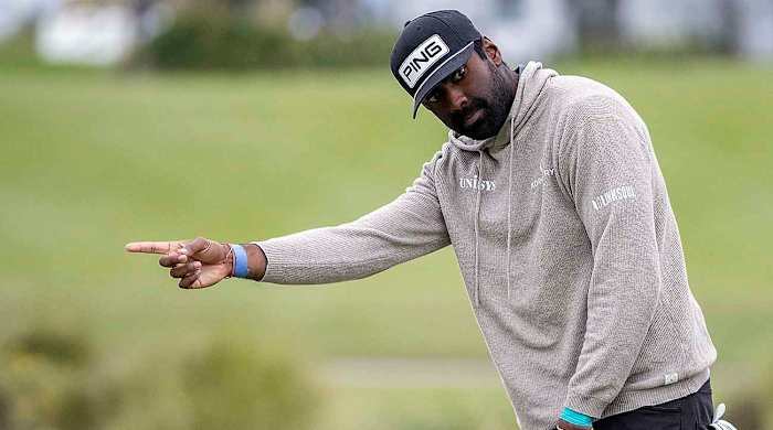 Sahith Theegala reacts after missing a birdie putt at the 2022 RSM Classic.